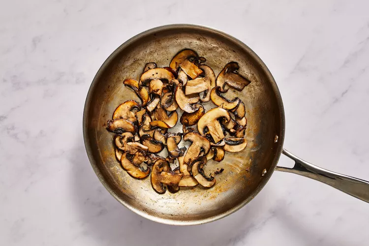 sautéeing the mushrooms until soft